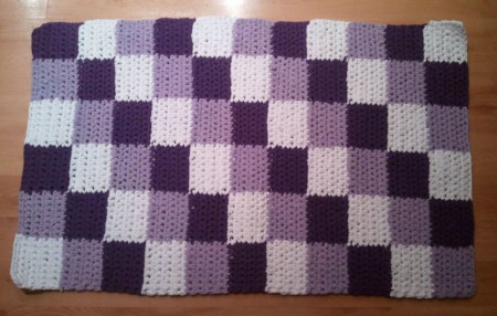 Háčkovaný koberec